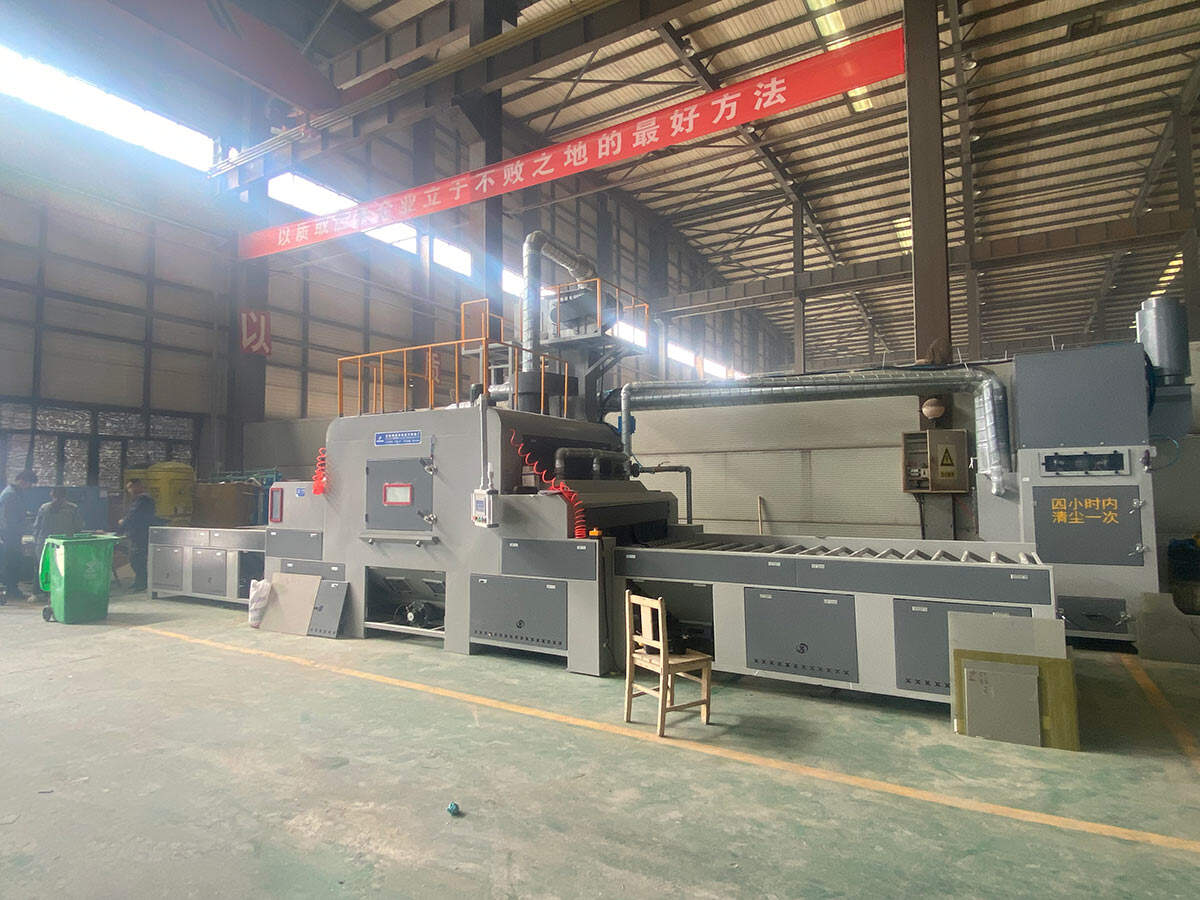 鑫百通输送式自动喷砂机设备